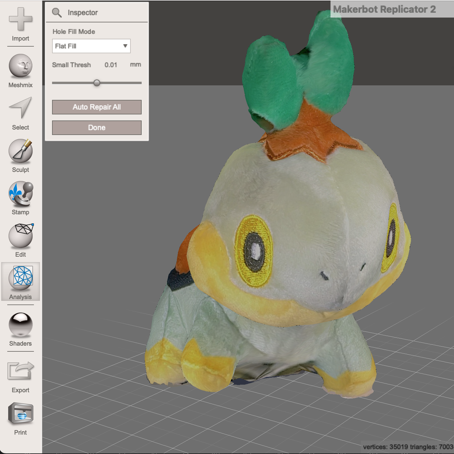 Importing him into meshmixer let me free him from his shackles and clean him up.